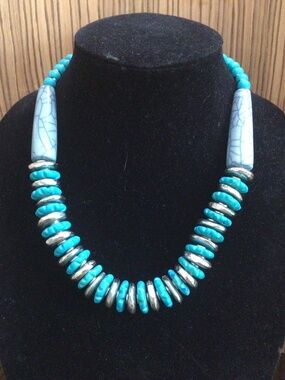 Very unique turquoise and silver necklace. Excellent shape.